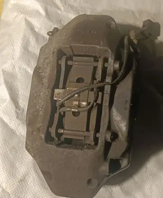 Volkswagen Touareg I Front brake caliper 209236062A