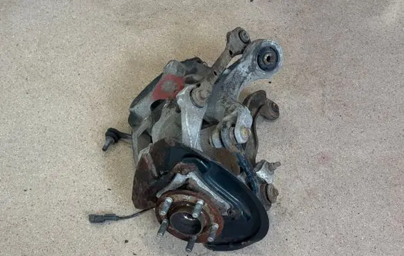 Rear wheel hub spindle/knuckle