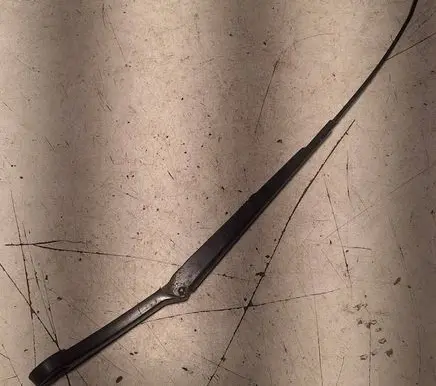 Front wiper blade arm