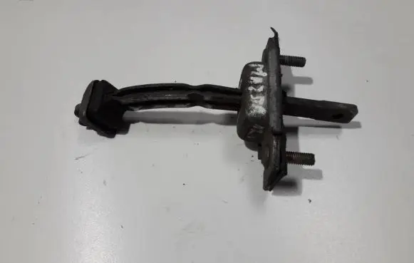 Mazda 121 Rear door check strap stopper