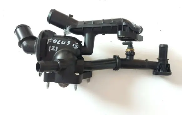 Thermostat/thermostat housing