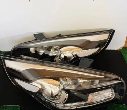 KIA Carens III Headlights/headlamps set 92101-A4180 92102-A4140