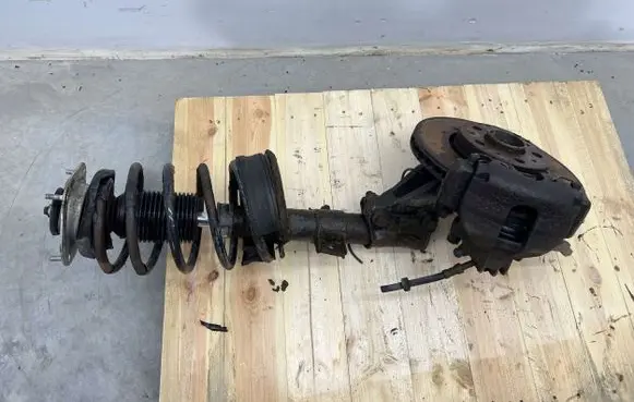 Front shock absorber with coil spring