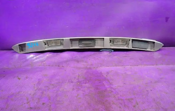 Renault Megane II Trunk door license plate light bar 