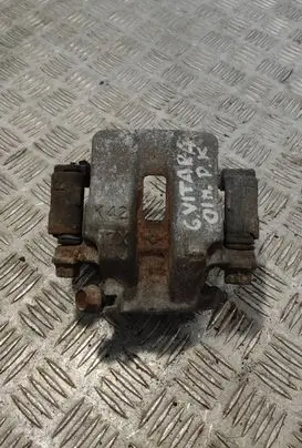 Suzuki Grand Vitara I Front brake caliper 