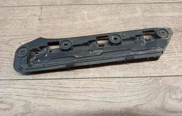 Volkswagen Touran I Front bumper mounting bracket 1T0807936