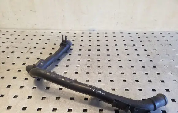 Volkswagen PASSAT B7 Engine coolant pipe/hose 03L121065AJ