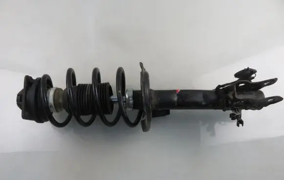 Front shock absorber with coil spring