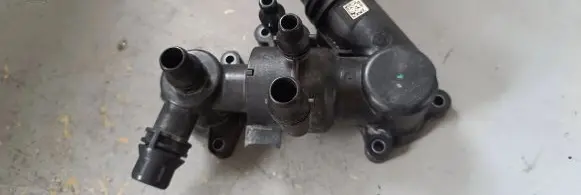 Thermostat/thermostat housing