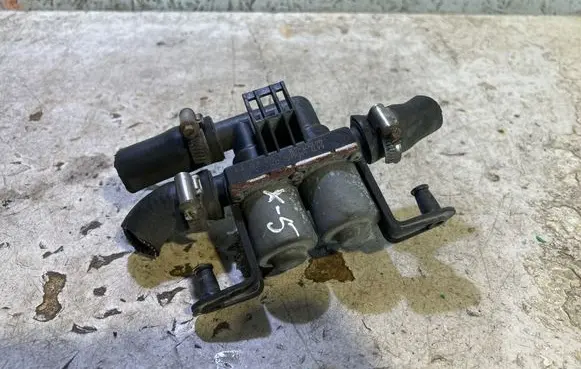 Coolant heater control valve
