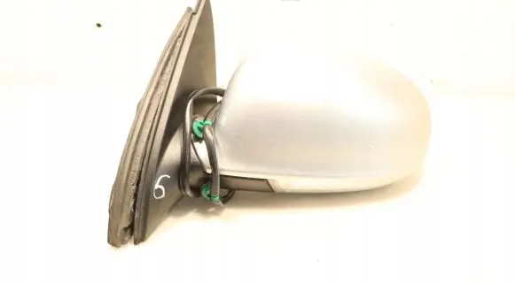Volkswagen Jetta V Front door electric wing mirror E11010836