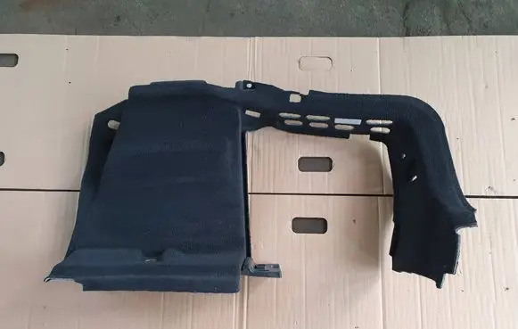 Trunk/boot lower side trim panel
