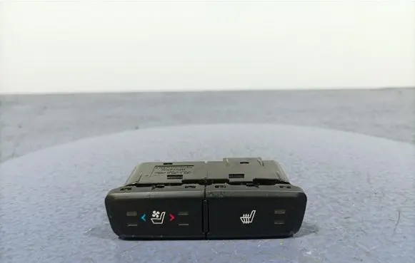 Seat heating switch