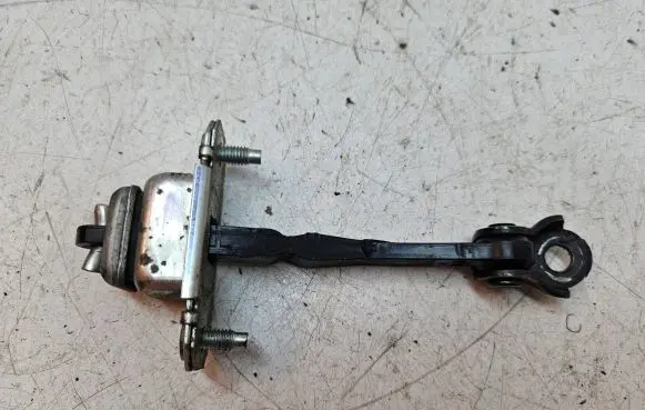 Subaru Legacy Front door check strap stopper