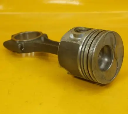 Volkswagen Golf V Piston with connecting rod 038G