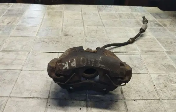 Mazda 3 I Front brake caliper