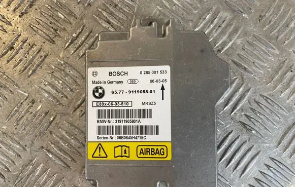 BMW 1 E81 E87 Airbag control unit/module 9119058 0285001533 31911905801A