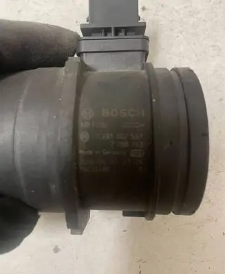 BMW 1 E81 E87 Mass air flow meter 7788743 16252485 0281002537