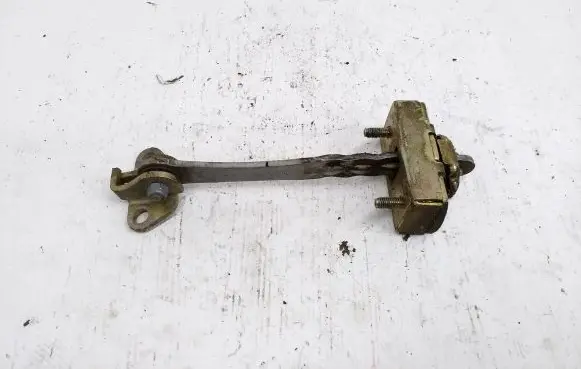 Front door check strap stopper