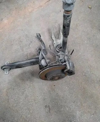 Rear wheel hub spindle/knuckle