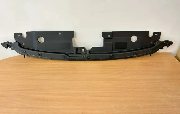 Engine bonnet/hood lock trim molding