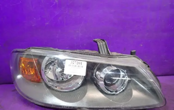 Nissan Almera Tino Headlight/headlamp 215-1196R-LHD
