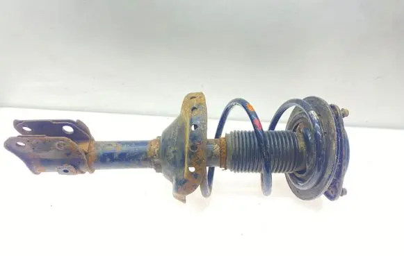 Subaru Legacy Front shock absorber with coil spring