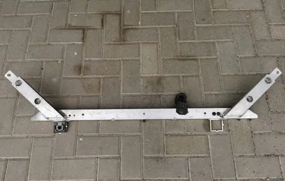 Top upper radiator support slam panel