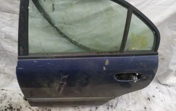 Mitsubishi Carisma Rear door MELYNOS