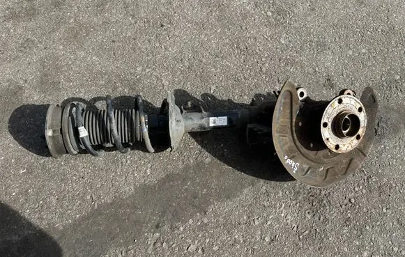 Skoda Octavia Mk3 (5E) Front wheel hub spindle knuckle 5q0413023