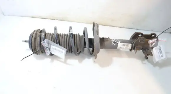 Opel Corsa D Front shock absorber with coil spring