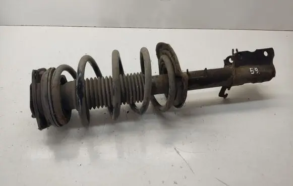 Front shock absorber with coil spring