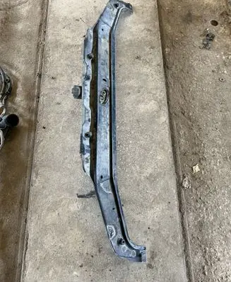 Top upper radiator support slam panel