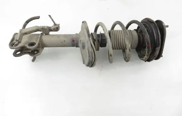 Toyota Corolla E110 Front shock absorber with coil spring 