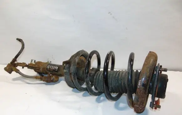 Nissan Primera Front shock absorber with coil spring 54302AV625 54010AV660
