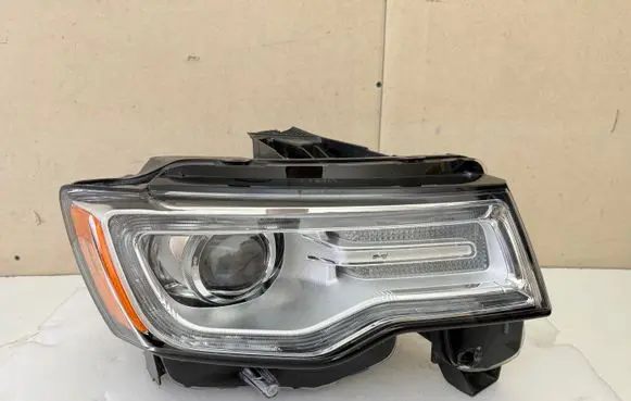 Jeep Grand Cherokee Headlight/headlamp 68111000AF 323504