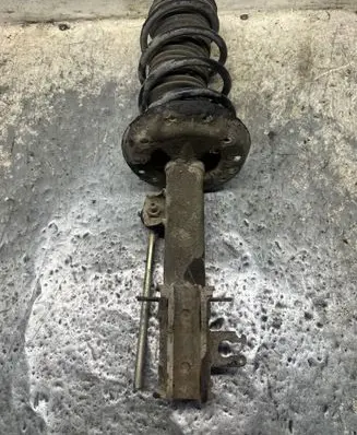 Opel Corsa D Front shock absorber with coil spring