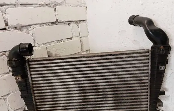 Opel Zafira B Intercooler radiator 13223395