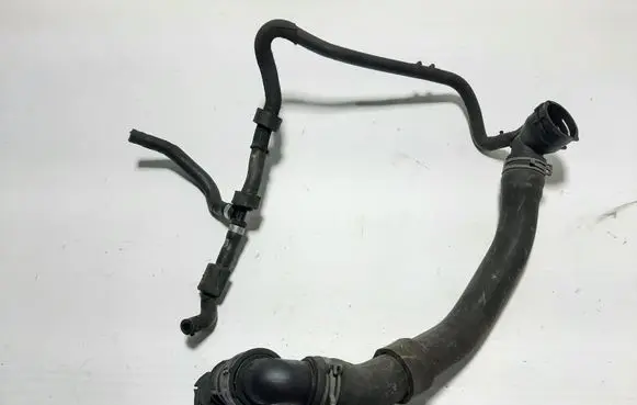 Volkswagen Golf VII Engine coolant pipe/hose 5Q0122101BP