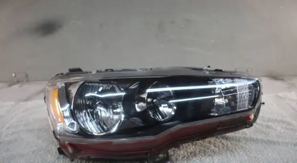 Mitsubishi Lancer VIII Headlight/headlamp 830103-38 83010338 0209162318