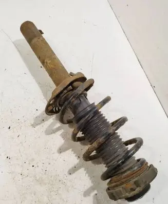 Volkswagen Golf V Front shock absorber with coil spring