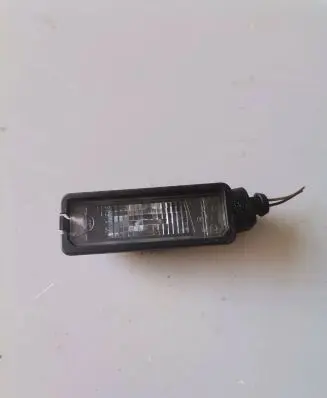 Volkswagen Scirocco Number plate light 1K8943021