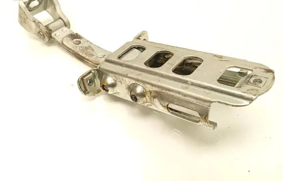 Front door check strap stopper