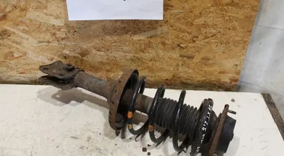 Subaru Forester SG Front shock absorber with coil spring