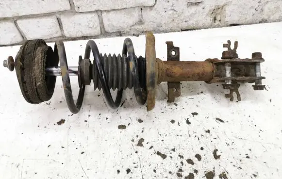 Renault Laguna III Front shock absorber with coil spring