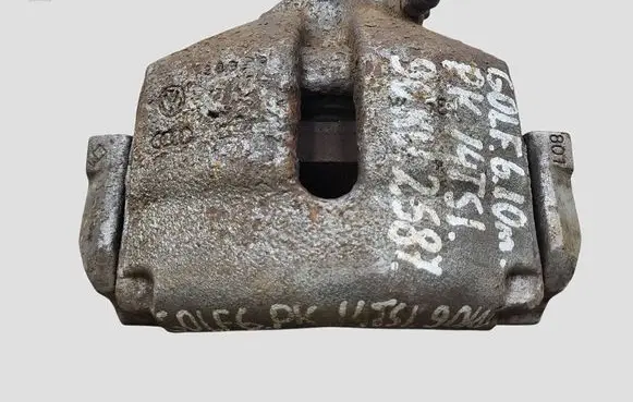 Volkswagen Golf VI Front brake caliper