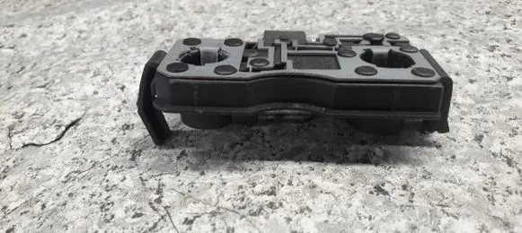 Nissan Primera Tail light bulb cover holder