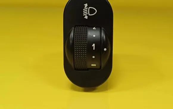 Headlight level height control switch