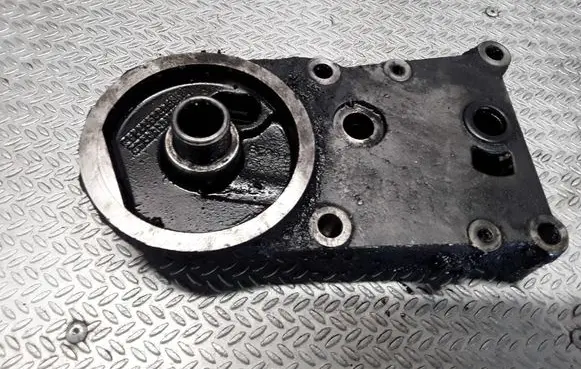 Ford Focus Oil filter mounting bracket YS6Q6L686AB