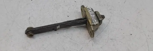 Front door check strap stopper